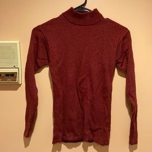 A red turtleneck sweater